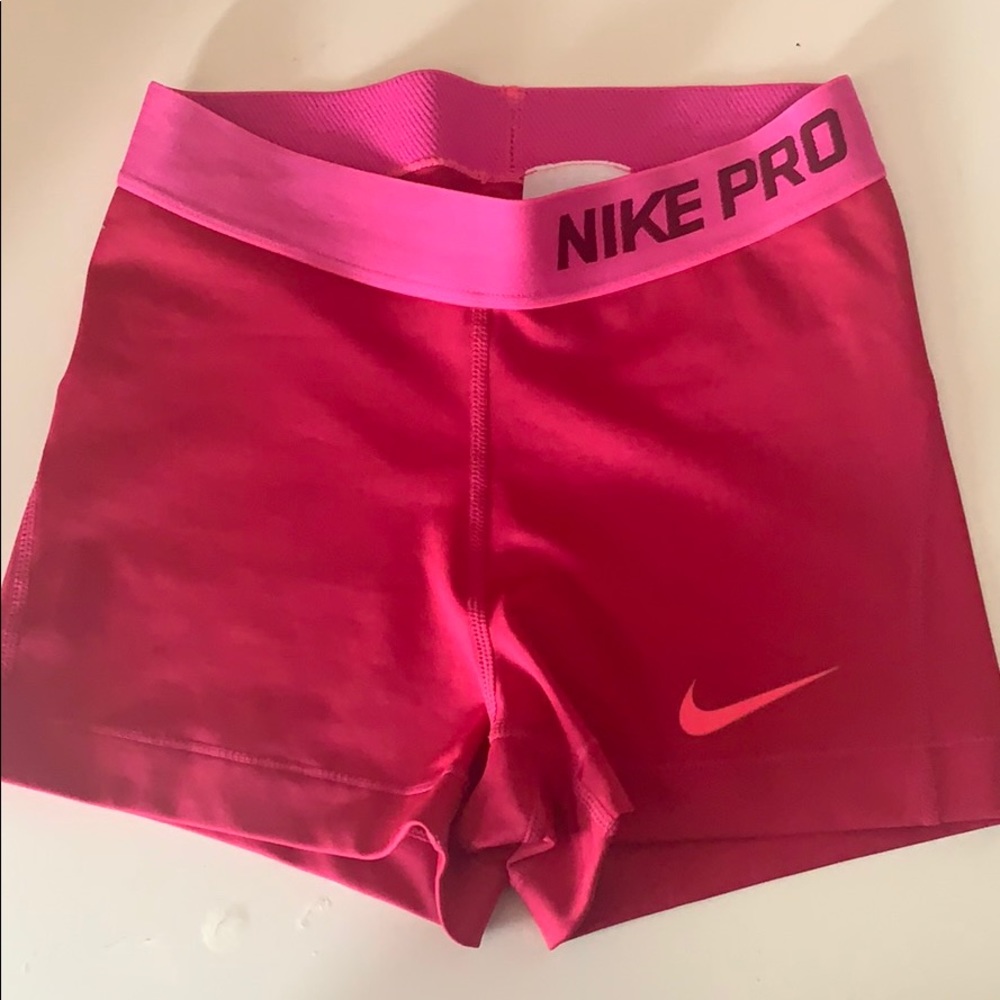 pink nike pro shorts